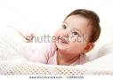 Cute Funny Infant Baby Looking Up In Left Corner Smiling And Show ... - stock-photo-cute-funny-infant-baby-looking-up-in-left-corner-smiling-and-show-tongue-beautiful-kid-s-face-118880506