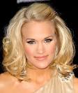 Carrie Underwood's flirty shoulder-length waves with pinned-back bangs