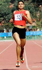 Manjit Kaur of Indian Punjab on her way to winning the gold medal in the 200m final during the first Indo-Pak Punjab Games in Patiala on Friday. - sp2