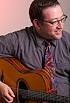 Aaron Lieberman, guitar and vocals. Aaron joined the group in the summer of ... - aaron-may-2011