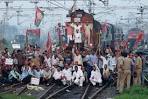 Indian protesters block train during national strike - Australia.