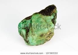 stock photo : Uncut and raw Emerald crystal. This natural Emerald still has host rock. Save to a lightbox ▼. Please Login. - stock-photo-uncut-and-raw-emerald-crystal-this-natural-emerald-still-has-host-rock-present-107397233