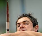 Jake Arnold of the US concentrates during the javelin competition in the ... - bs21
