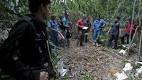 Mass graves believed to contain dead migrants found in Malaysia.