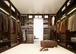 Beautiful brown color theme large walk in closet design with clean ...