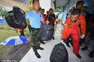 AirAsia bodies taken to hospital for identification | Daily Mail.
