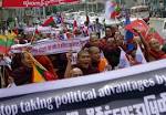 Hundreds protest in Myanmar against voting rights for Rohingya.