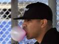 Blue Jays pitcher Ricky Romero blows a gum balloon during practice at their ... - ricky-romero