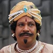 The latest we hear is that Vadivelu will be playing dual roles in the film as the King and as the court jester Thenali Raman. - v8-002