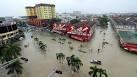 Thousands flee Malaysia floods, dam wall broken
