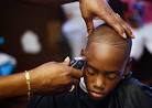 Florida, US: Devonte Brown has a hair cut at the 13th St Barber Shop in ... - Devonte-Brown-has-his-hai-005