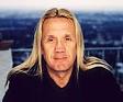 ... lived-in face, Nicko McBrain enjoys the rare distinction of being both ... - Nicko-McBrain