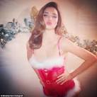 Miranda Kerr gives fans a sexy Christmas treat by posing in