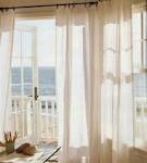 Lovely Creamy Blinds And Curtains Together Covering Door Windows ...