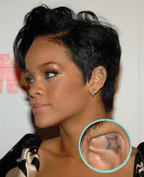 Rihanna's tattoos Images?q=tbn:ANd9GcTKSJ9mqC77vf4IRiEUD_J-B2GXJHlkWY52qAfmQ_2n_Jo2WKz6qw