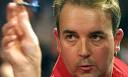 Phil Taylor in action against John Part during the world darts final in 2003 - Phil-Taylor-in-action-aga-001