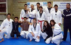 LAU students with coach Mark Rjeily (1st from right) after the distribution of the medals. - taekwondo-fsul2010-02-big