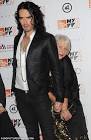 Flirty Russell Brand and Helen Mirren act up on the red carpet at