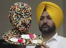 Artist Harwinder Singh Gill displays a creation at his residence in the ... - f04da2db14840f70bc540a