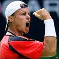 ... and sees off the challenge of Canada's Frank Dancevic 6-4 6-4 3-6 6-4 - _42465705_hewittap300
