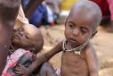 Internally displaced Somali children are seen outside their shelter at a ... - mazimi20110730100033047