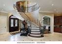 Foyer In Luxury Home With Circular Staircase Stock Photo 58978066 ...