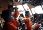 Search expands for AirAsia airliner that disappeared Sunday.
