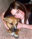 SILT BILL: Angela Burgess with her dog, Blaze. The dog's favourite toy is ... - 4902901