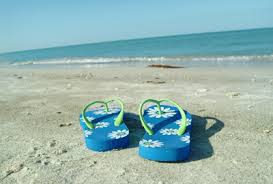 File:Blue flip flops on a beach.jpg - Wikimedia Commons