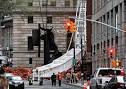 Update: Workers lower NYC crane that hit building last night ...