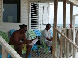 San Pedro, Belize: Kurt (Kirk?) and Captain Avi on the porch. Rate: Report as inappropriate. Kurt (Kirk?) and Captain Avi on the porch (joseph m, May 2012) - filename-p1000179-jpg
