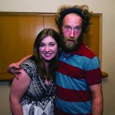 poses with Josh Blue after