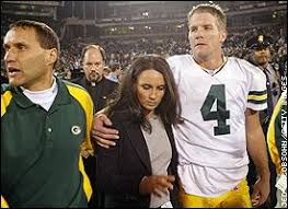 Favre leaves the field with