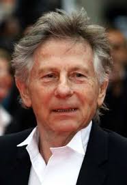 Roman Polanski in wing collar