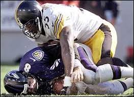 The Ravens defense poses a