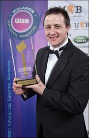Chris Harris with his award