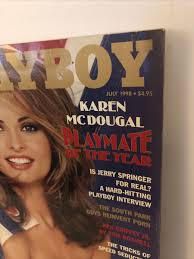 Playboy founder hugh hefner center poses with playmates left jpg x Karen mcdougal