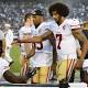 Kaepernick, Reid take a knee during national anthem 