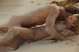 Redhead tranny is enjoying wild sex on the beach jpg x Sex on the beach