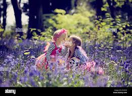 two little girls kissing|Little girl kissing her sister — Stock Photo © tan4ikk #43328869