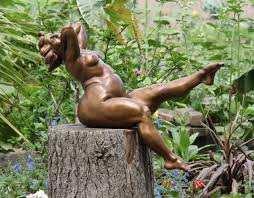 mature squatting nudists|Naked man in squatting position on rock at sea stock photo