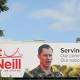 Labor candidate for Brisbane Pat O'Neill asked to remove billboard by Department of Defence 