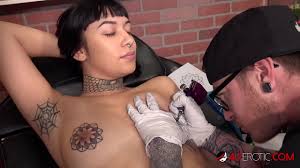 Two massive tits with tattoos jpg x Tattooed tits