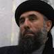 Violent past revisited as Afghanistan signs accord with notorious warlord 