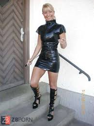 Hot asian mistress in latex pegging a slave in action jpg x Latex strapon dominatrix