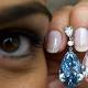 Sotheby's Sells Pink, Blue Diamond Earrings for About $51M 