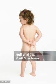 naked little girls |Contented Naked Little Baby Girl Playing写真素材1232854813 ...