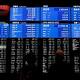 Asian stocks, gold fall as Fed keeps June hike in play; dollar up 