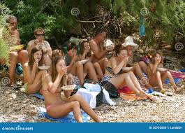 nudist beach    famoly|Naked Family In Hats Sitting On The Beach Stock Photo ...