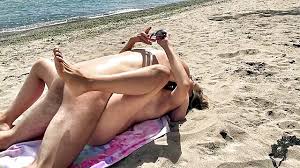 Four hot goddesses sunbathing and chilling on nude beach on vacation jpg x Nude at the beach